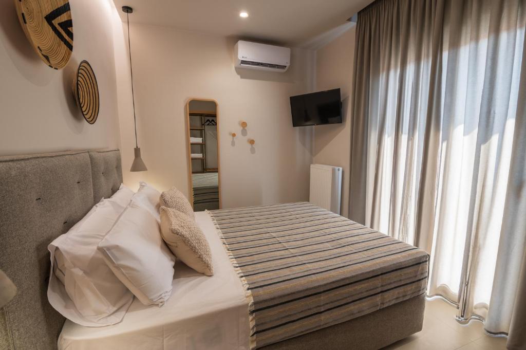 Postel nebo postele na pokoji v ubytování Palaia Luxury Suite