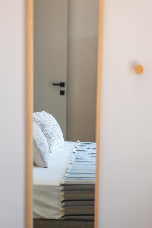 Postel nebo postele na pokoji v ubytování Palaia Luxury Suite