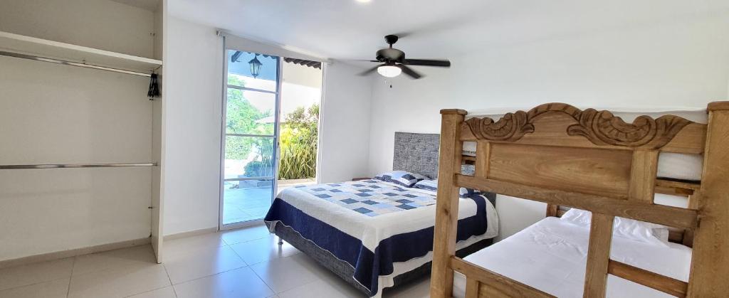 Postel nebo postele na pokoji v ubytování Extraordinaria CASA FINCA Piscina AA