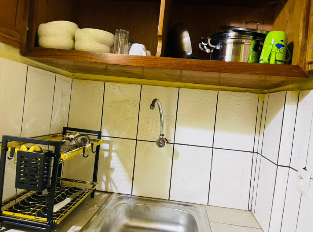 Kuchyň nebo kuchyňský kout v ubytování Complexe BEL AIR