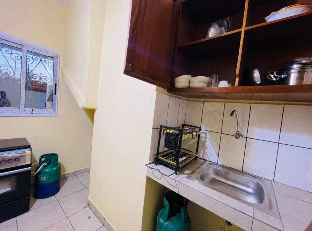 Kuchyň nebo kuchyňský kout v ubytování Complexe BEL AIR