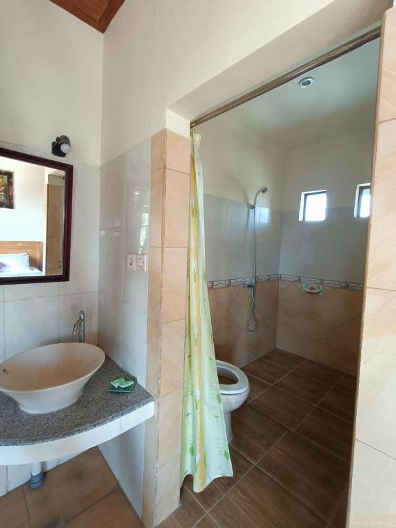 Koupelna v ubytování wahyu accomodation