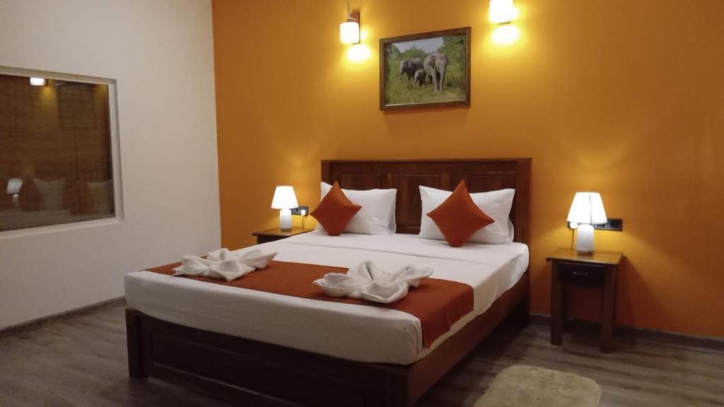 Postel nebo postele na pokoji v ubytování Ali Weta Safari Resort