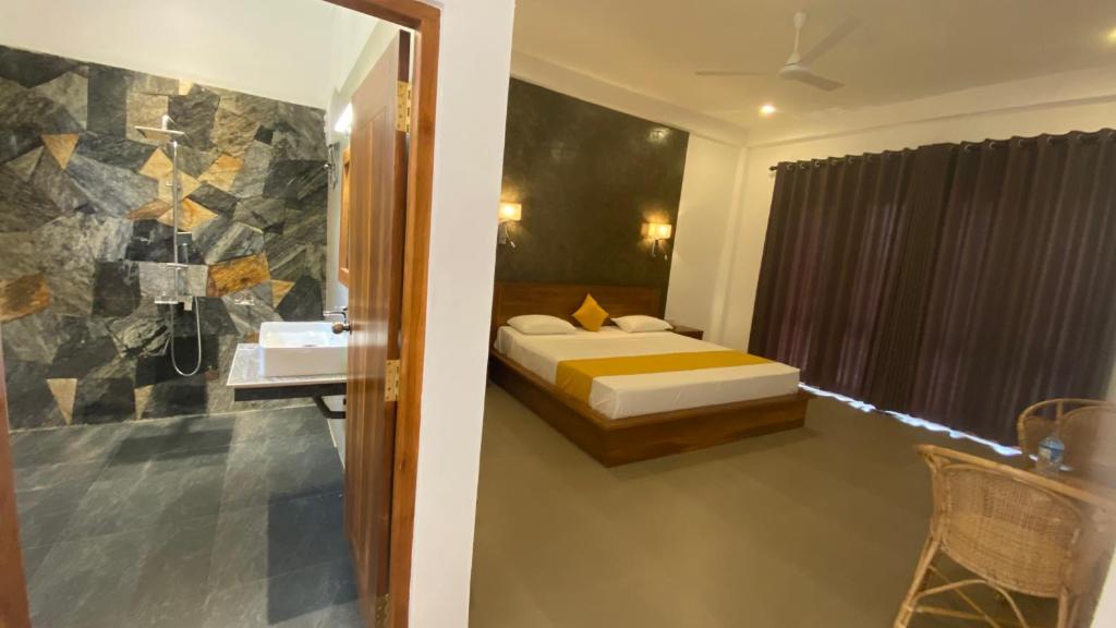 Postel nebo postele na pokoji v ubytování Lina Hotel