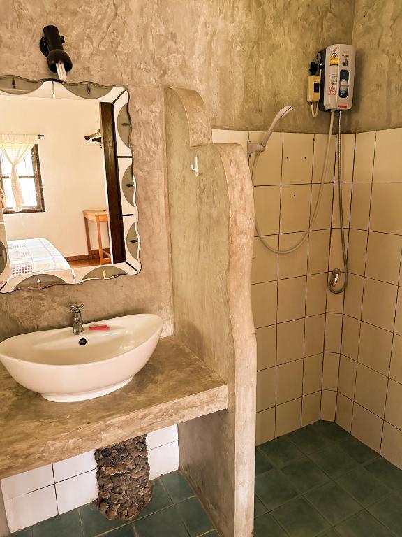 Koupelna v ubytování Pairadise Hotel