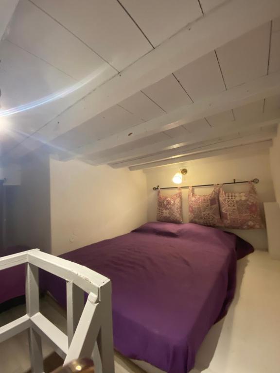 Postel nebo postele na pokoji v ubytování Pensione Della Nonna