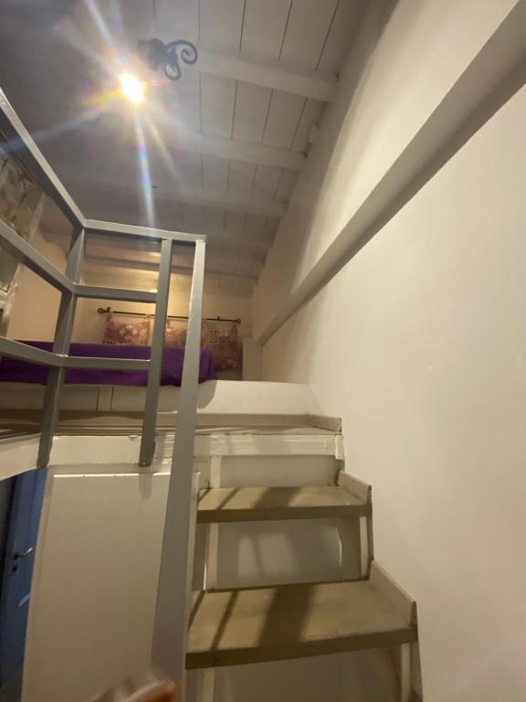 Palanda nebo palandy na pokoji v ubytování Pensione Della Nonna
