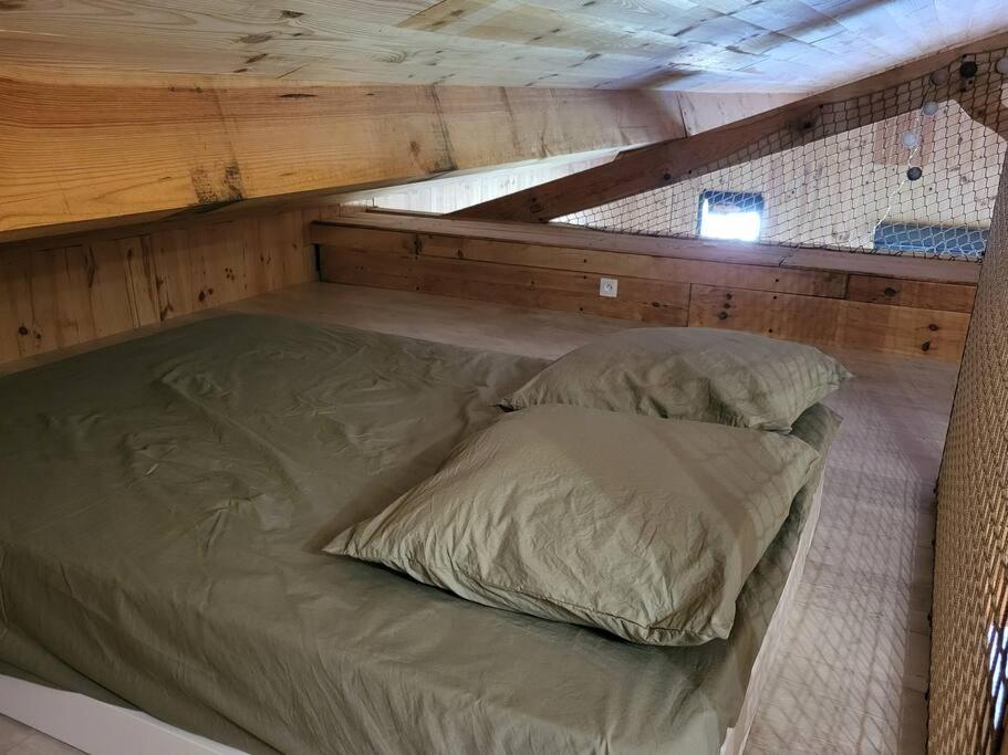 Postel nebo postele na pokoji v ubytování La cabane d' Esting