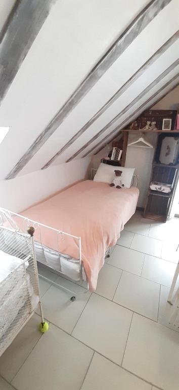 Postel nebo postele na pokoji v ubytování LA P'TITE MAISON