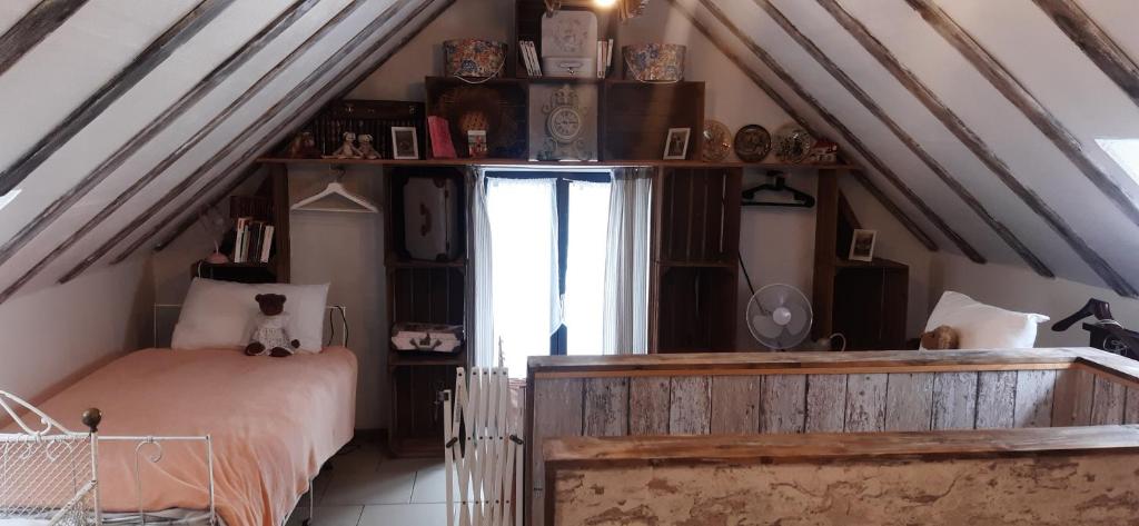 Postel nebo postele na pokoji v ubytování LA P'TITE MAISON