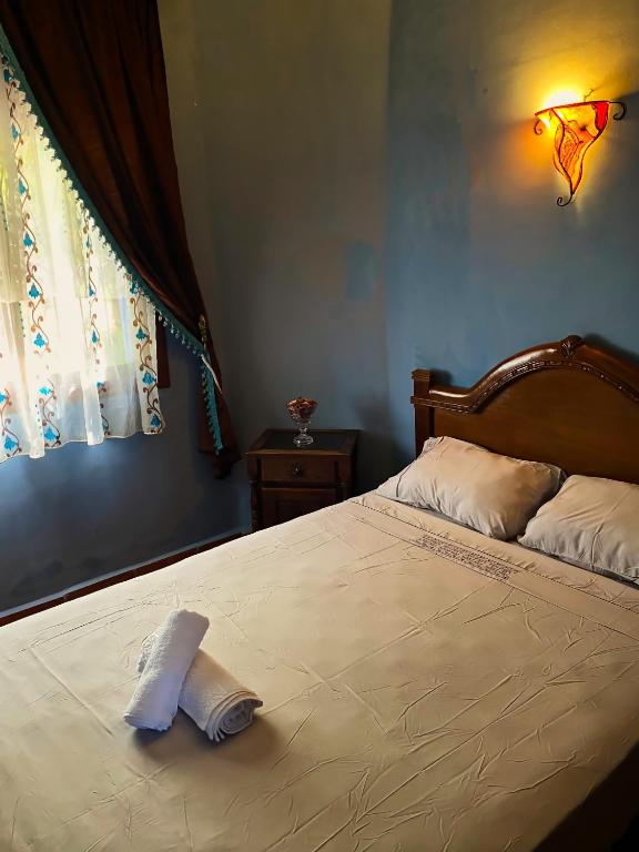 Postel nebo postele na pokoji v ubytování Villa Authentique avec Vue Panoramique à 3 km de Chefchaouen