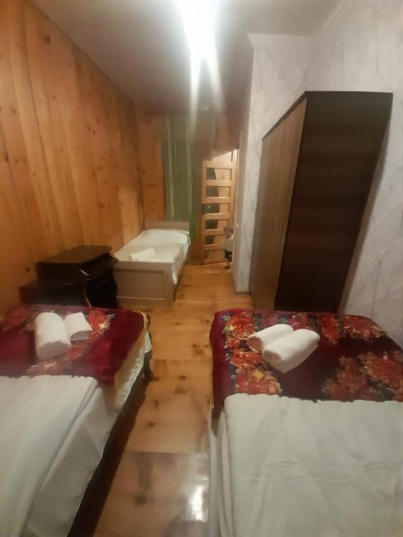 Postel nebo postele na pokoji v ubytování Guest House Gvidani