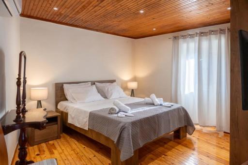 Ліжко або ліжка в номері Guest house (Gastouri)