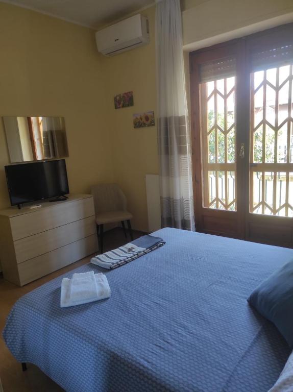 A bed or beds in a room at R Family