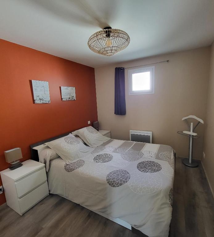 Postel nebo postele na pokoji v ubytování LE TOURISTIC Appartements