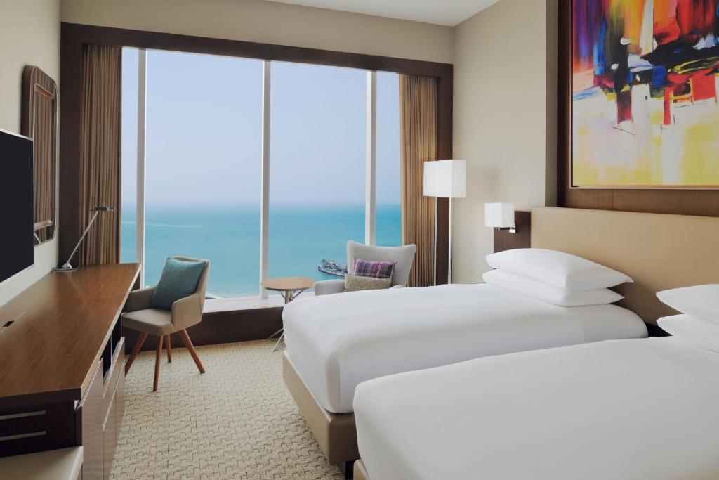 Postel nebo postele na pokoji v ubytování Delta Hotels by Marriott City Center Doha