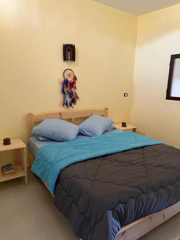 Postel nebo postele na pokoji v ubytování Haven Hideaway - Biet Moussa - بيت موسي
