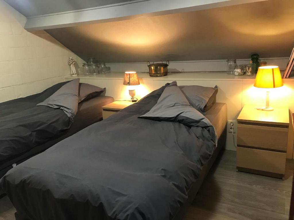 Postel nebo postele na pokoji v ubytování Grysperre B&B