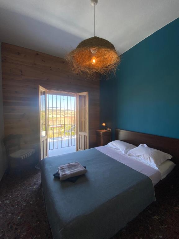 Posteľ alebo postele v izbe v ubytovaní Villa entre mer et montagne