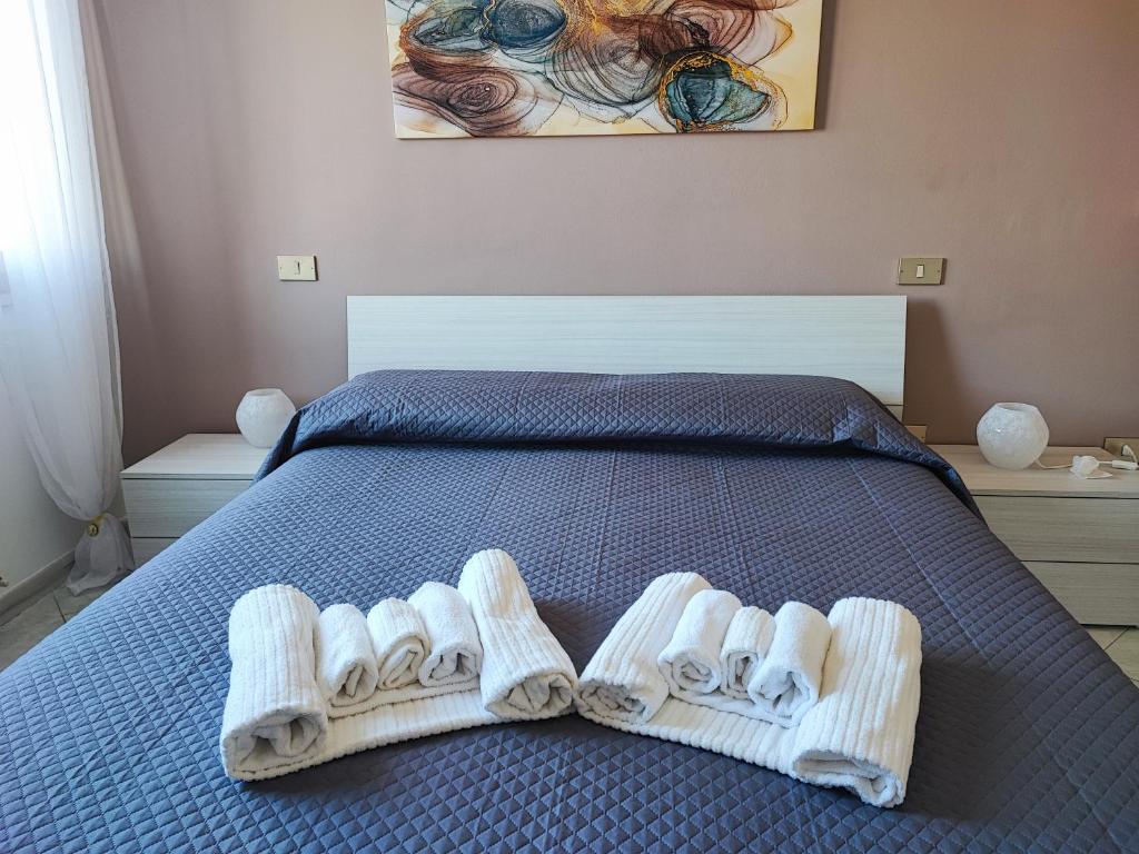 Кровать или кровати в номере Casa Vacanze Parco del Sole