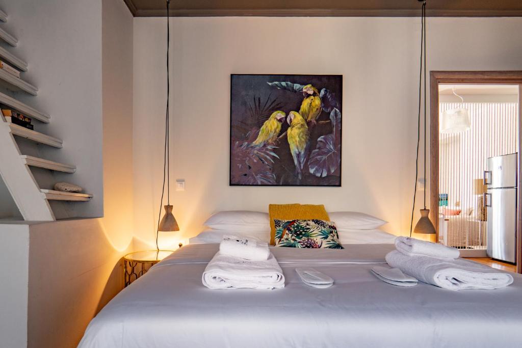 Posteľ alebo postele v izbe v ubytovaní Paxos Fairytales House 2