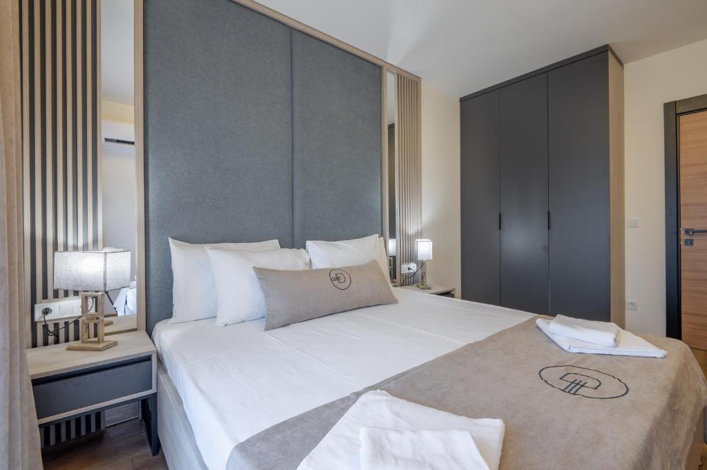 Postel nebo postele na pokoji v ubytování Dulamerovic Hotel