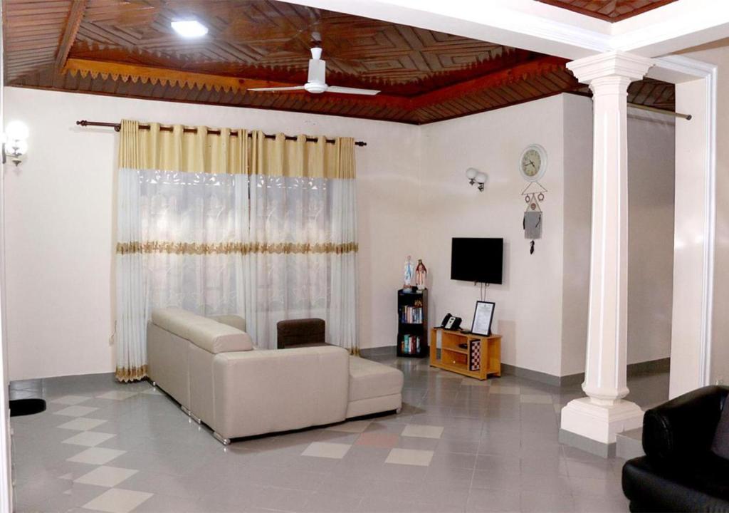 TV a/nebo společenská místnost v ubytování Cozy Inn Negombo