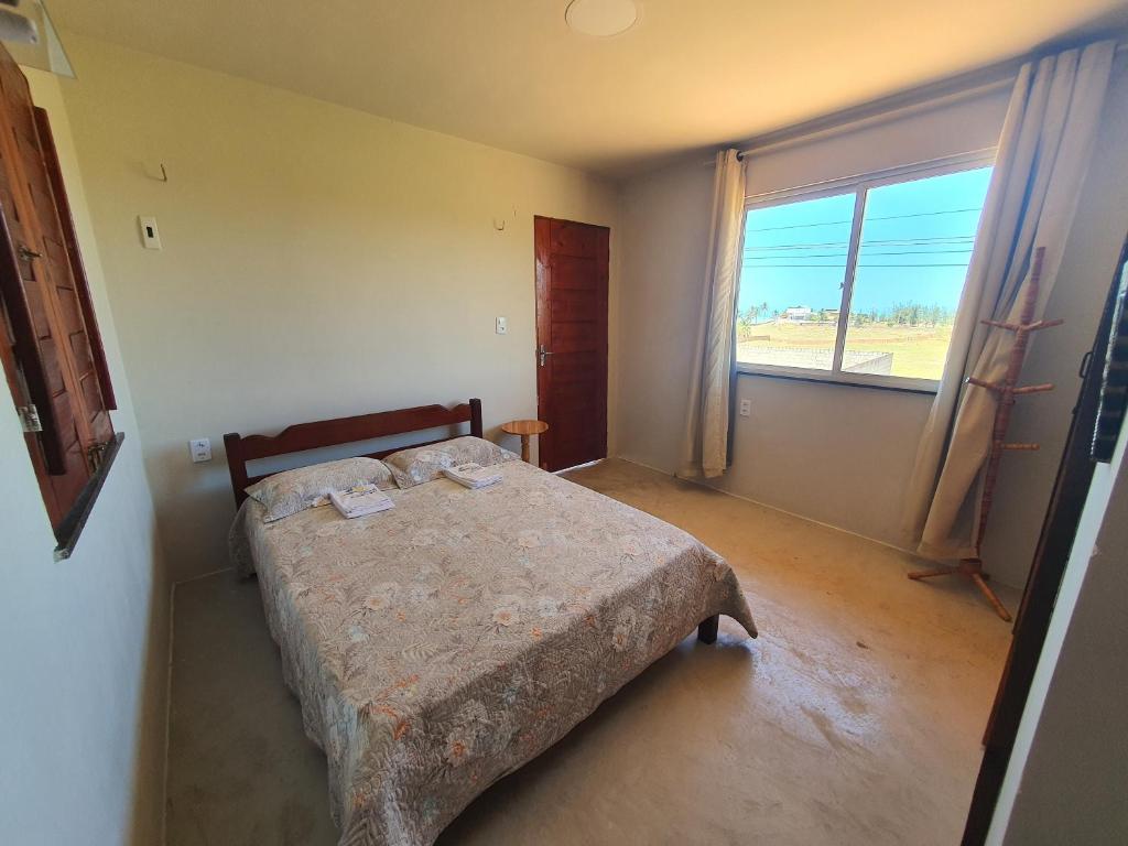 Postel nebo postele na pokoji v ubytování Morro Beach Itarema