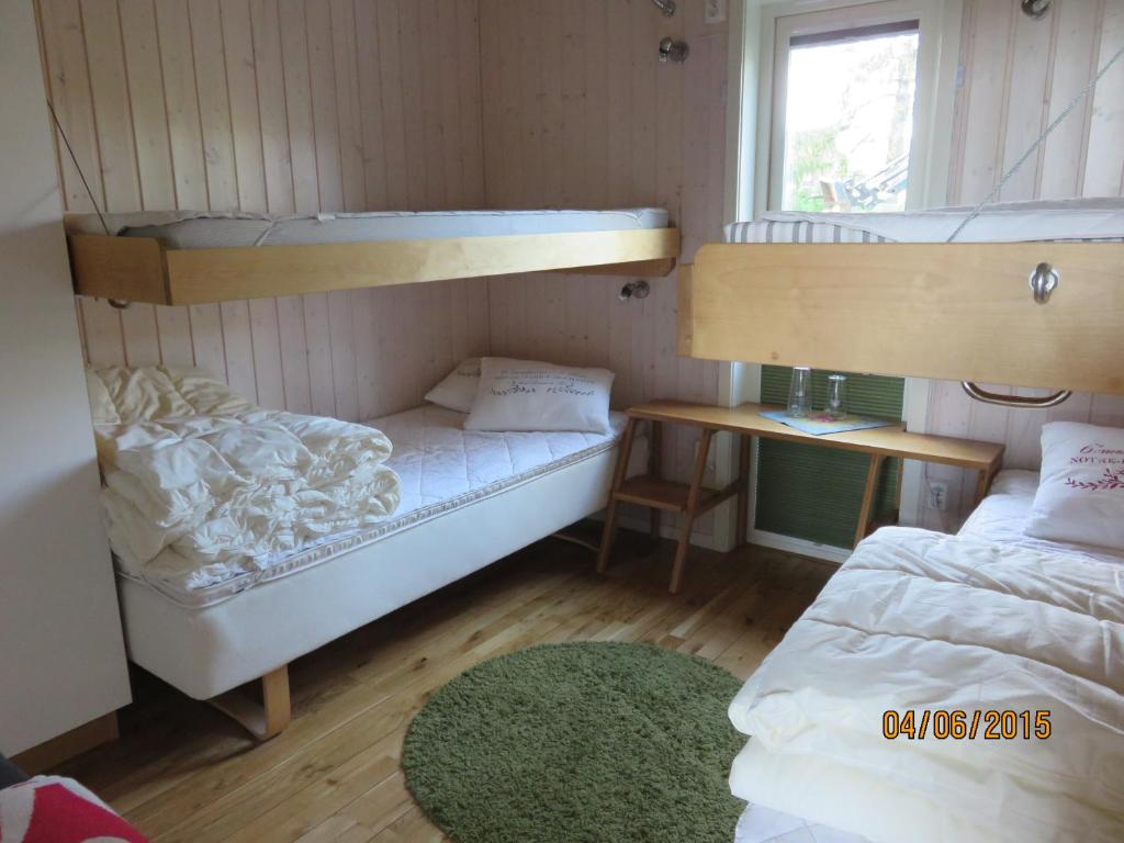 Postel nebo postele na pokoji v ubytování Enebackens Kraftkälla