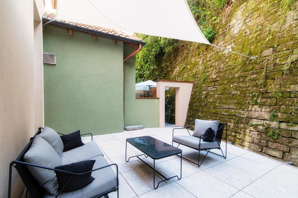 Posezení v ubytování Suites Lorodellago Como - The House Of Travelers