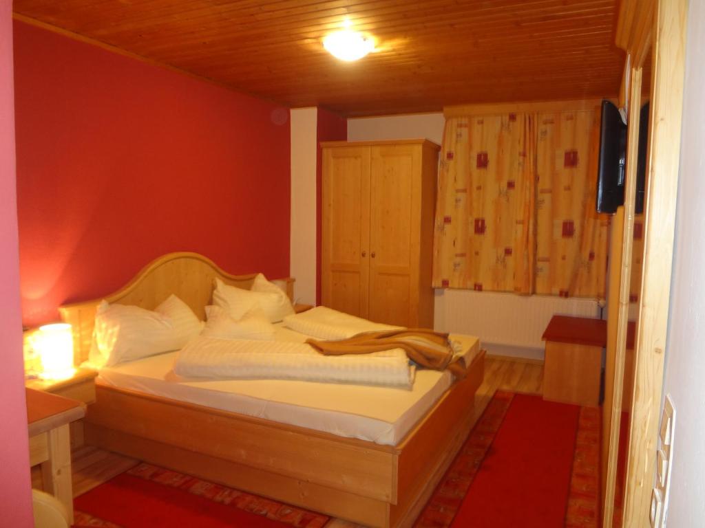 Posteľ alebo postele v izbe v ubytovaní Hotel Restaurant Gasthof Michal