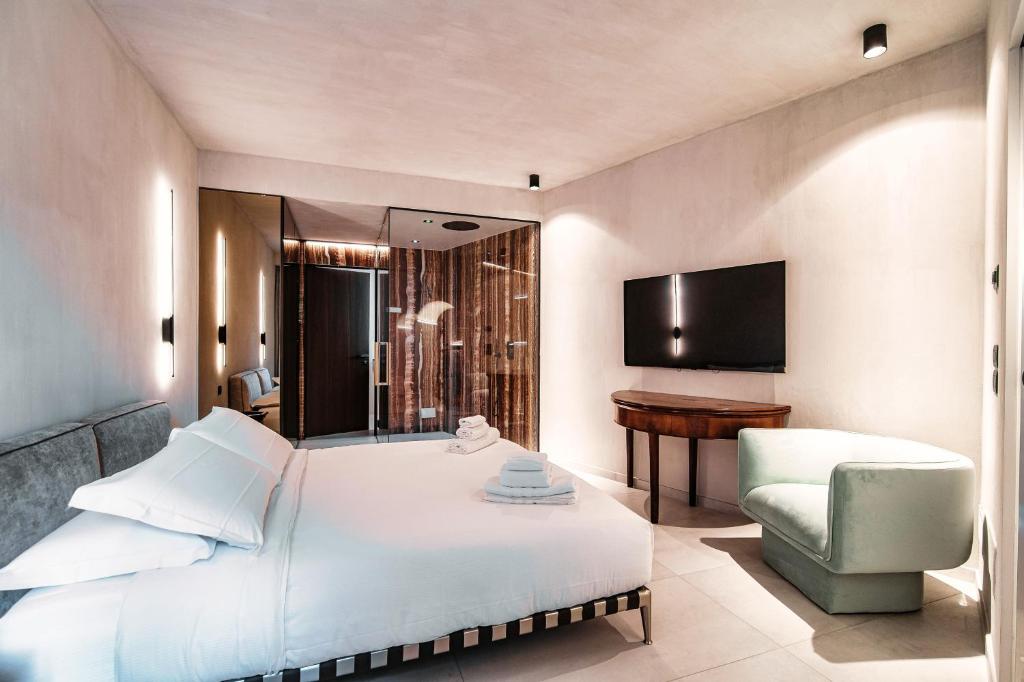 Postel nebo postele na pokoji v ubytování Suites Lorodellago Como - The House Of Travelers
