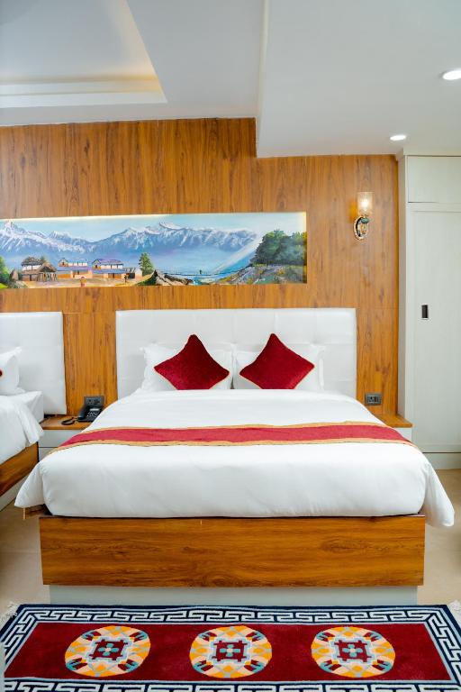 Postel nebo postele na pokoji v ubytování Hotel Palazzo