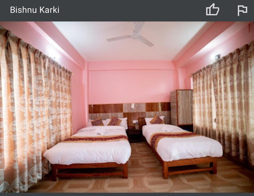 Hotel Peace Stupa客房内的一张或多张床位