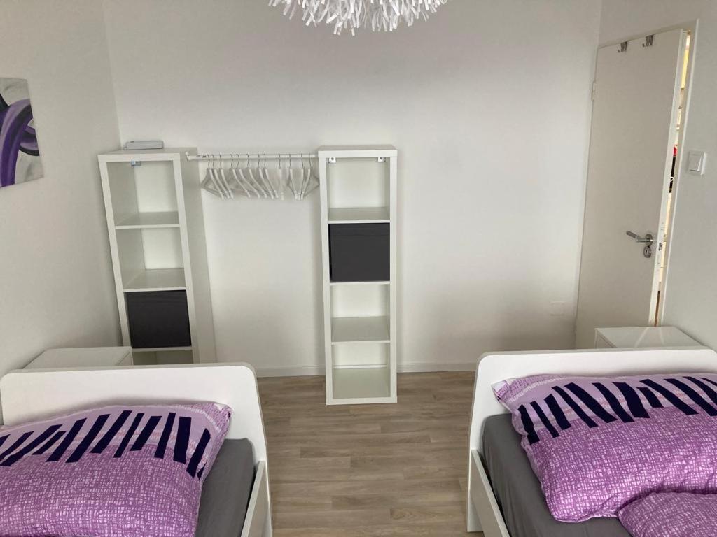 Postel nebo postele na pokoji v ubytování Renntraum über den Dächern von Knittelfeld