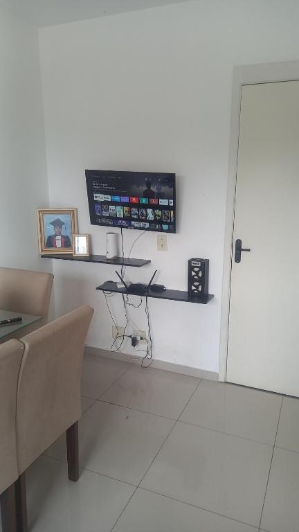 Телевізор і / або розважальний центр в Apartamento inteiro