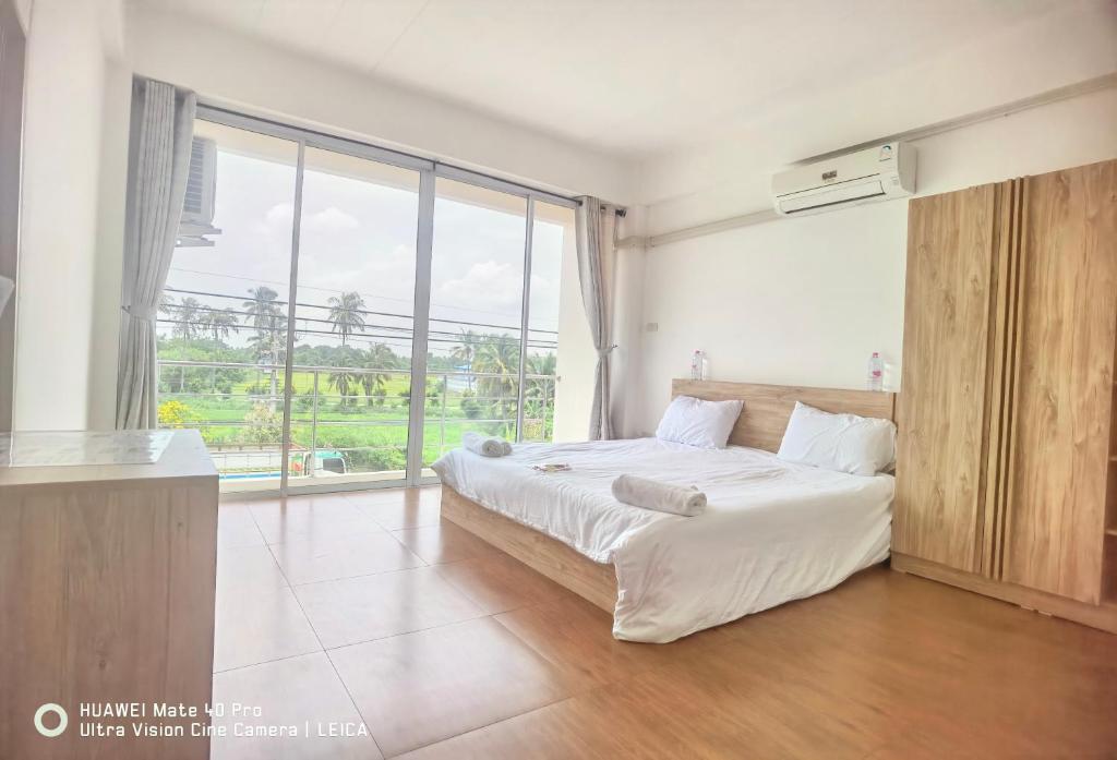 Fotografie z fotogalerie ubytování 115 Townhouse v destinaci Ban Khlong Krang