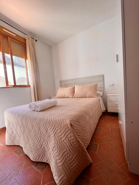 Posteľ alebo postele v izbe v ubytovaní APARTAMENTO LA MURALLA 2