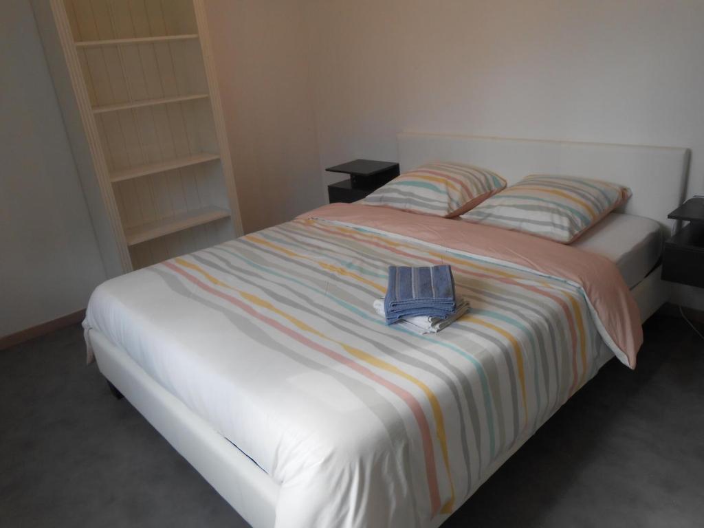Łóżko lub łóżka w pokoju w obiekcie Refuge au calme