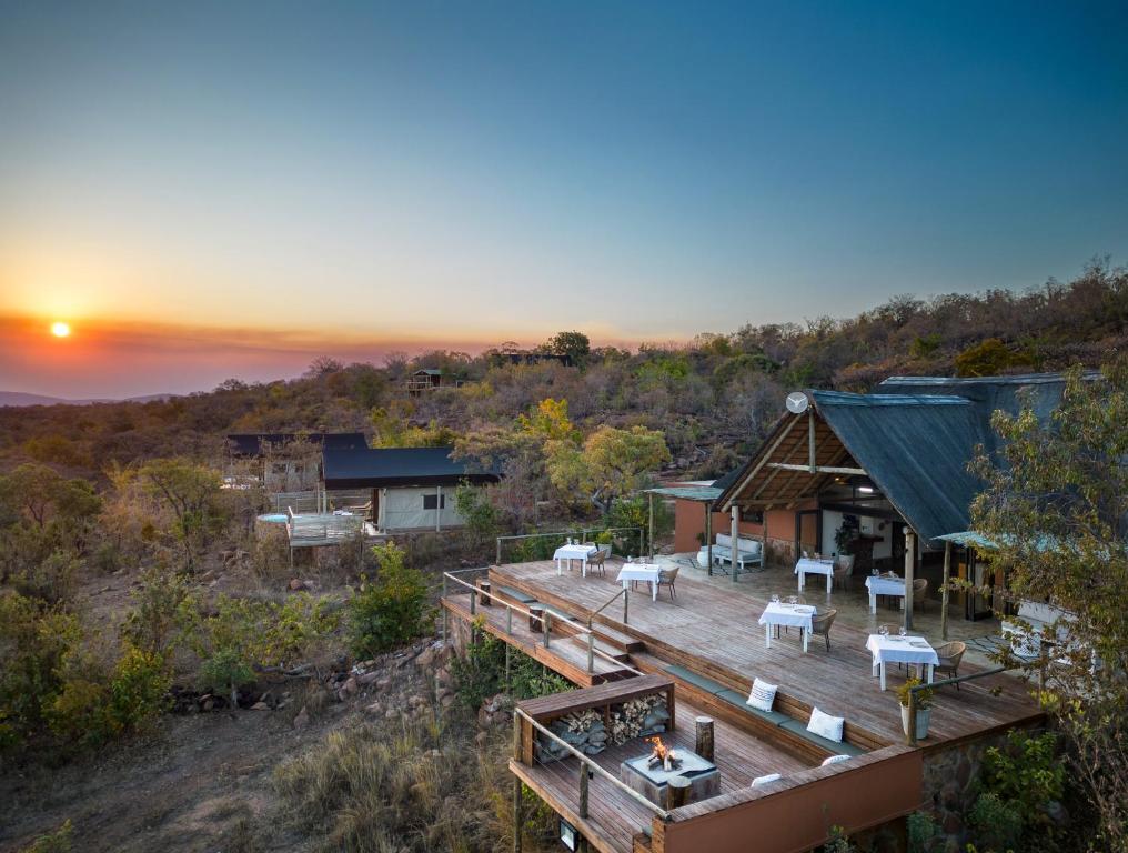 an aerial view of a house with a deck at Elephants Crossing in Welgevonden Game Reserve