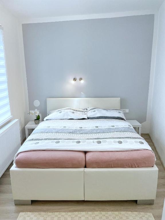 Postel nebo postele na pokoji v ubytování Apartmán U Náměstí