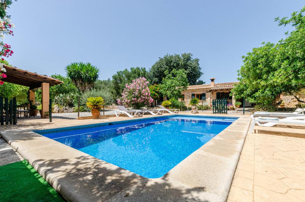 The swimming pool at or close to YourHouse Can Rafelino