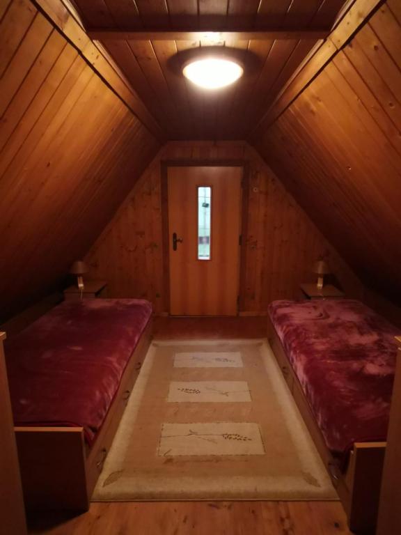 Postel nebo postele na pokoji v ubytování Domek na Polance