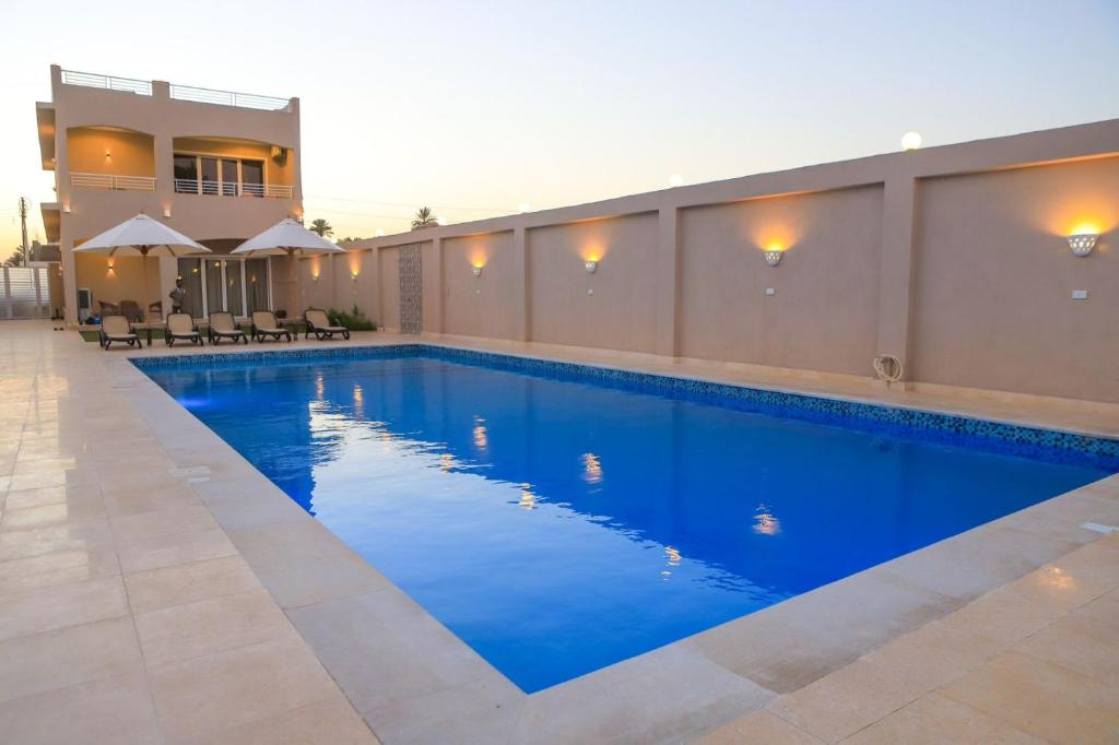 Bazén v ubytování Royal Nile Villa - Pool View Apartment 1 nebo v jeho okolí