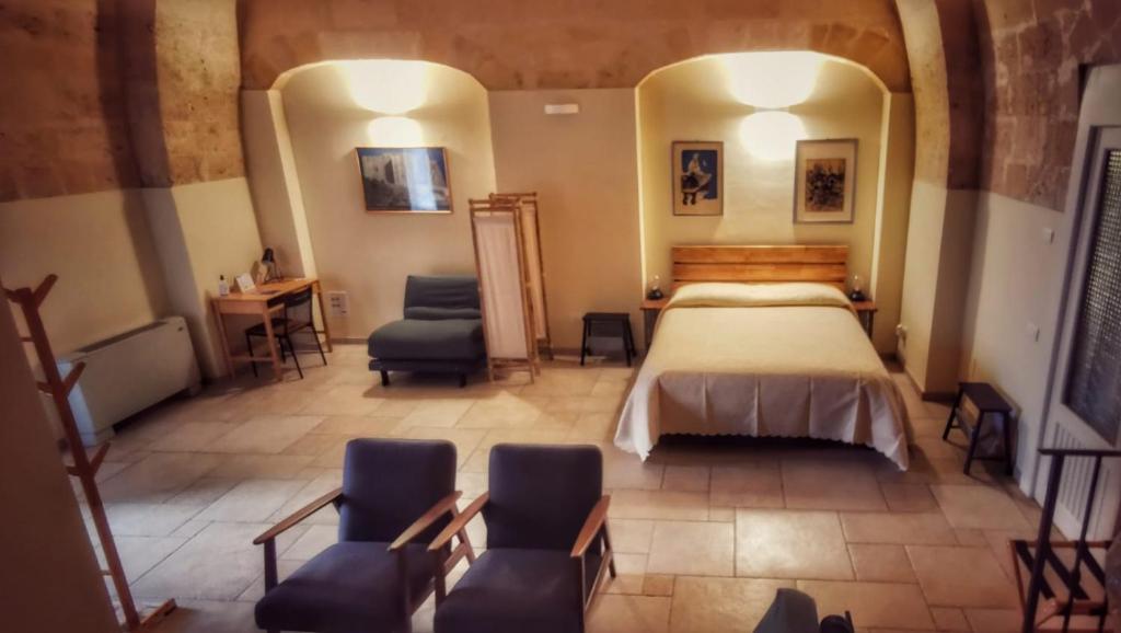 Postel nebo postele na pokoji v ubytování La Cisterna del Vicinato