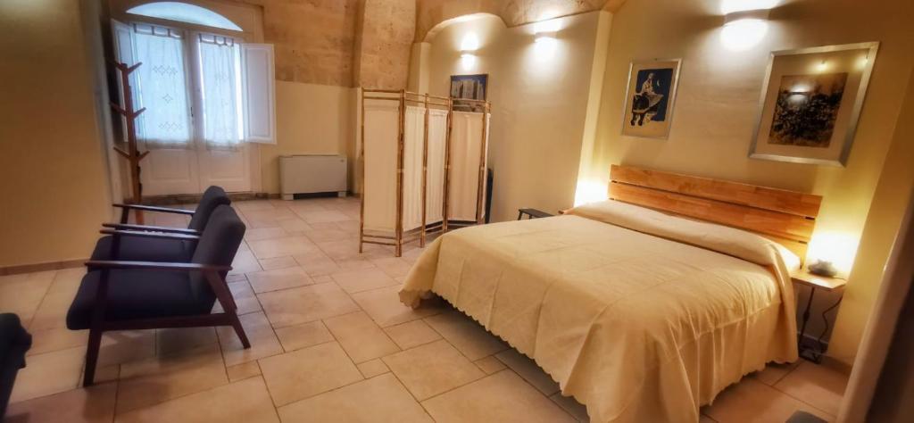 Postel nebo postele na pokoji v ubytování La Cisterna del Vicinato