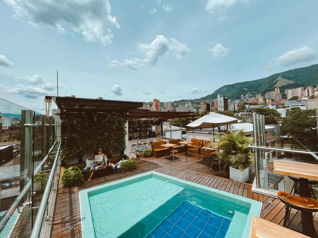 a swimming pool on the roof of a building at Rango Hostel Boutique in Medellín