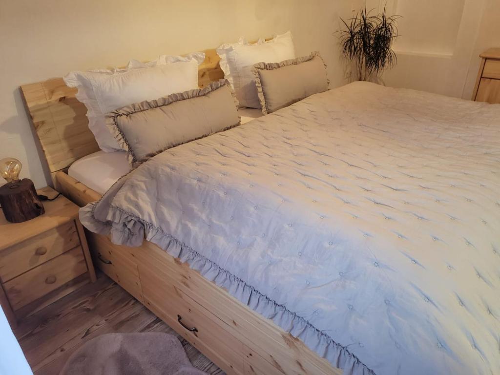 A bed or beds in a room at Naturoase