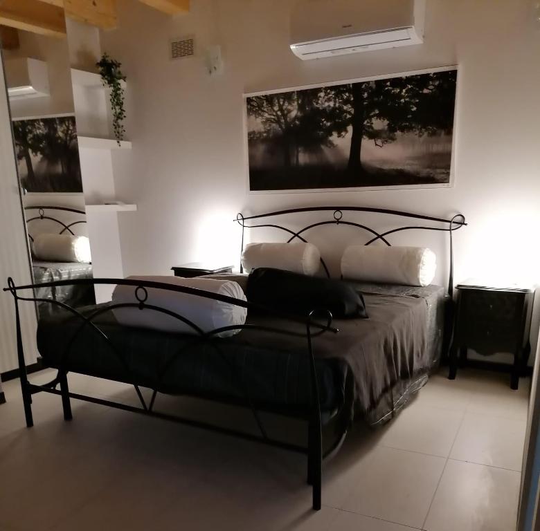 Postel nebo postele na pokoji v ubytování B&B FANCHETTI 1938
