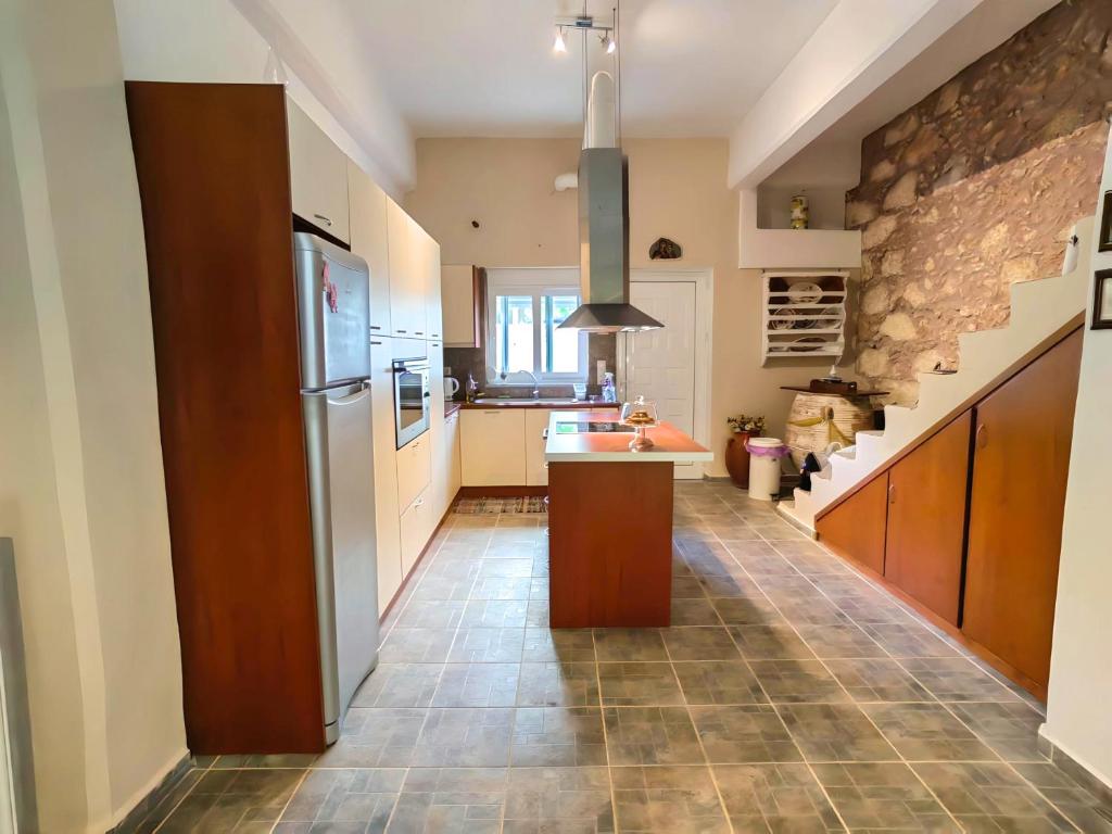 Η κουζίνα ή μικρή κουζίνα στο Villa Nelparadi